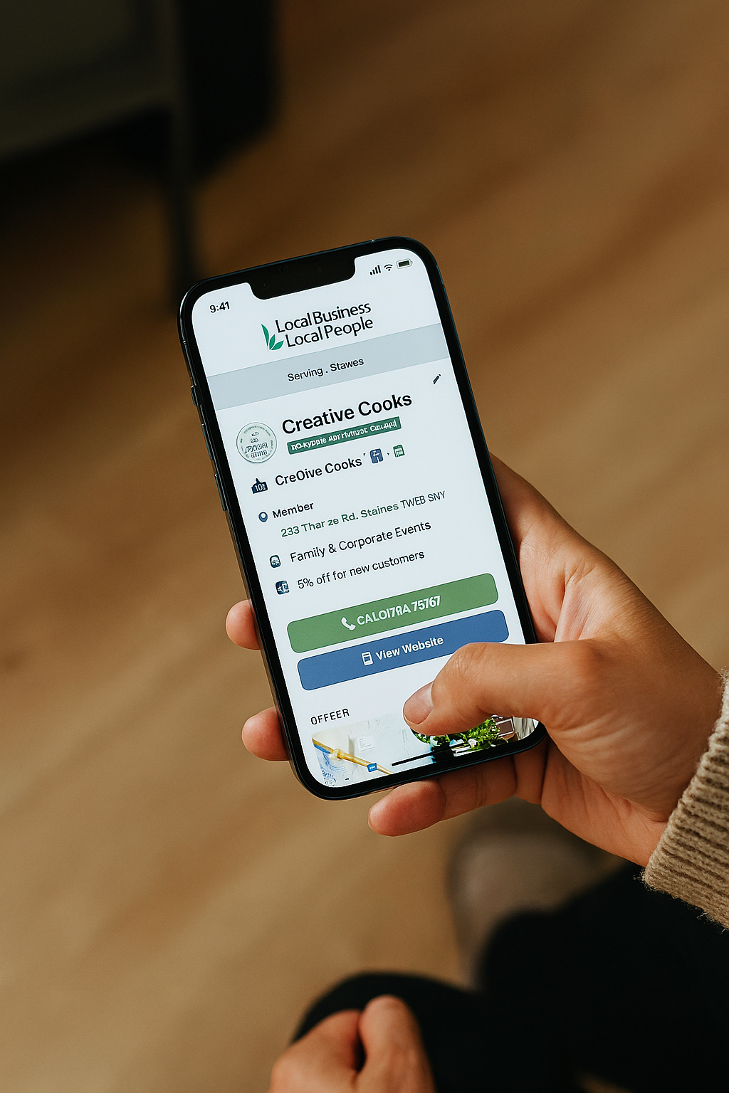 Local business owner viewing their community listing on a phone
